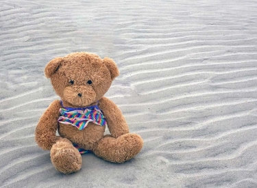 Teddy im Sand