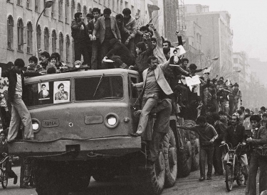  Dozens of demonstrators who have invaded an Iranian army truck, downtown on Wednesday, Jan. 17, 1979 in Tehran proceed in their joyful demonstration on the second day after the Shah‘s departure. 